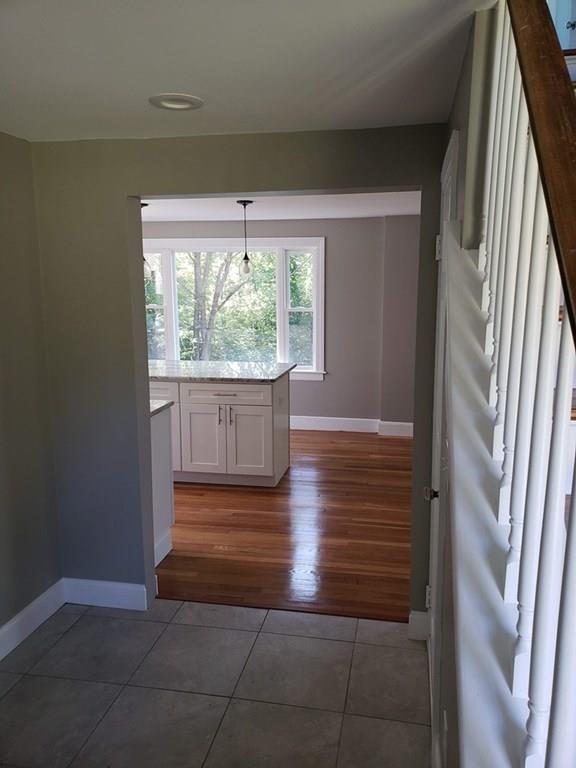 198 Lebanon Hill Road Southbridge, MA 01550 - Photo 9 of 37 a view of empty room with wooden floor and fan