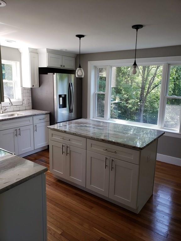198 Lebanon Hill Road Southbridge, MA 01550 - Photo 10 of 37 a kitchen with granite countertop a sink and refrigerator