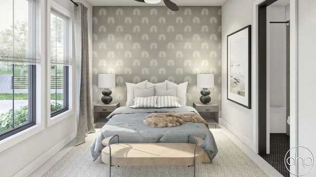 a bedroom with a bed and a large window