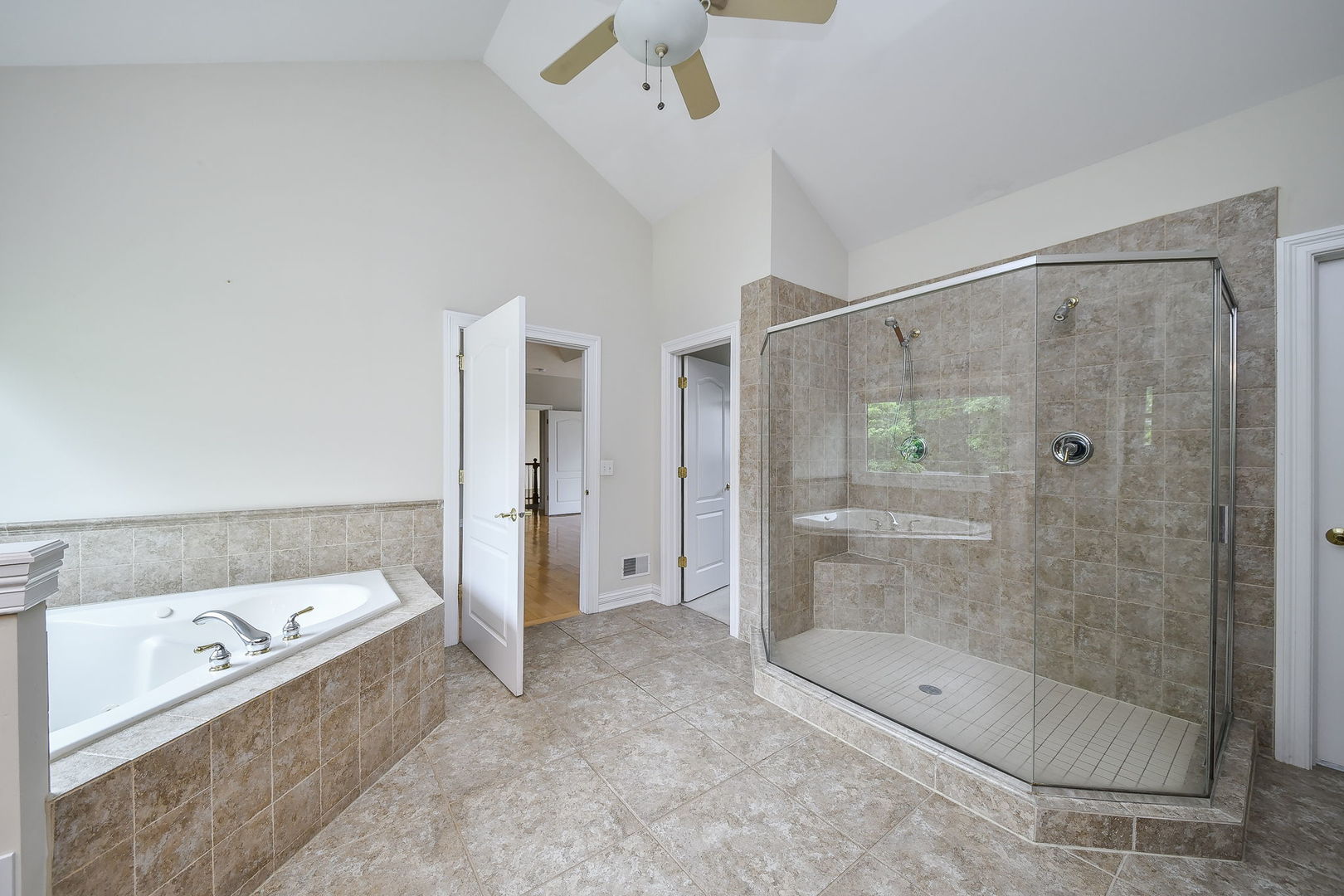 104 Bruell Street Yorkville, IL 60560 - Photo 22 of 35 a bathroom with a shower and a bathtub