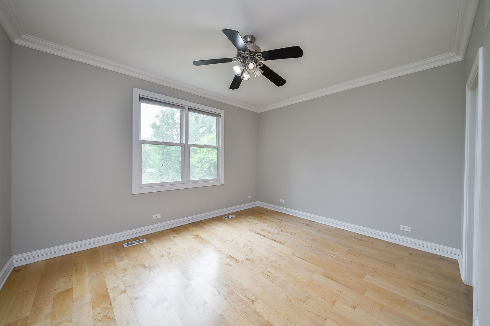 104 Bruell Street Yorkville, IL 60560 - Photo 27 of 35 wooden floor in an empty room with a window