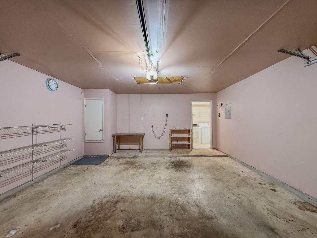 11101 Franklins Tale Loop Austin, TX 78748 - Photo 26 of 39 Garage featuring independent washer and dryer and electric panel