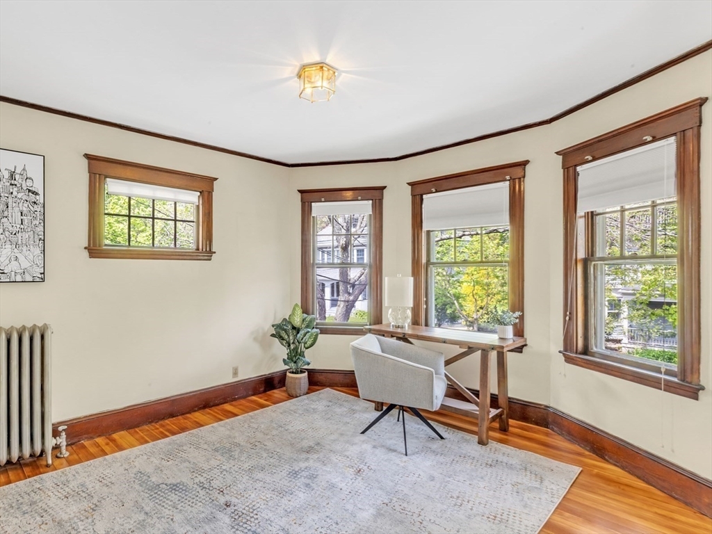115 Sumner Road Brookline, MA 02445 - Photo 15 of 25 a work room with furniture and windows