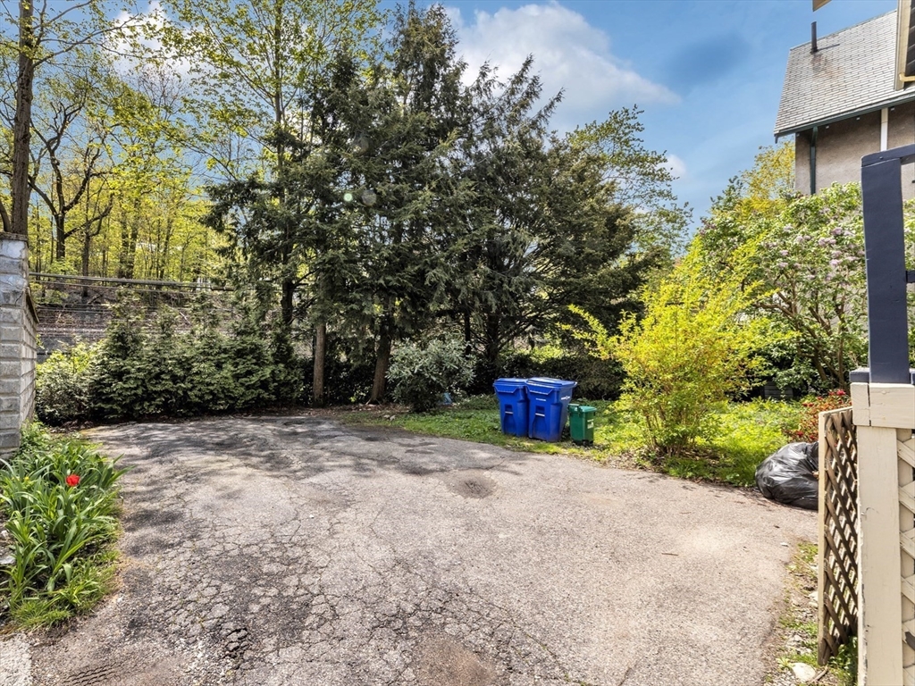 115 Sumner Road Brookline, MA 02445 - Photo 25 of 25 a view of an outdoor space and a yard