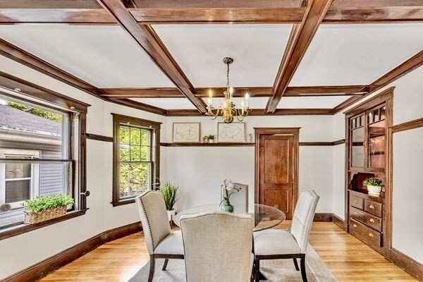 115 Sumner Road Brookline, MA 02445 - Photo 8 of 25 a view of a dining room with furniture window and wooden floor
