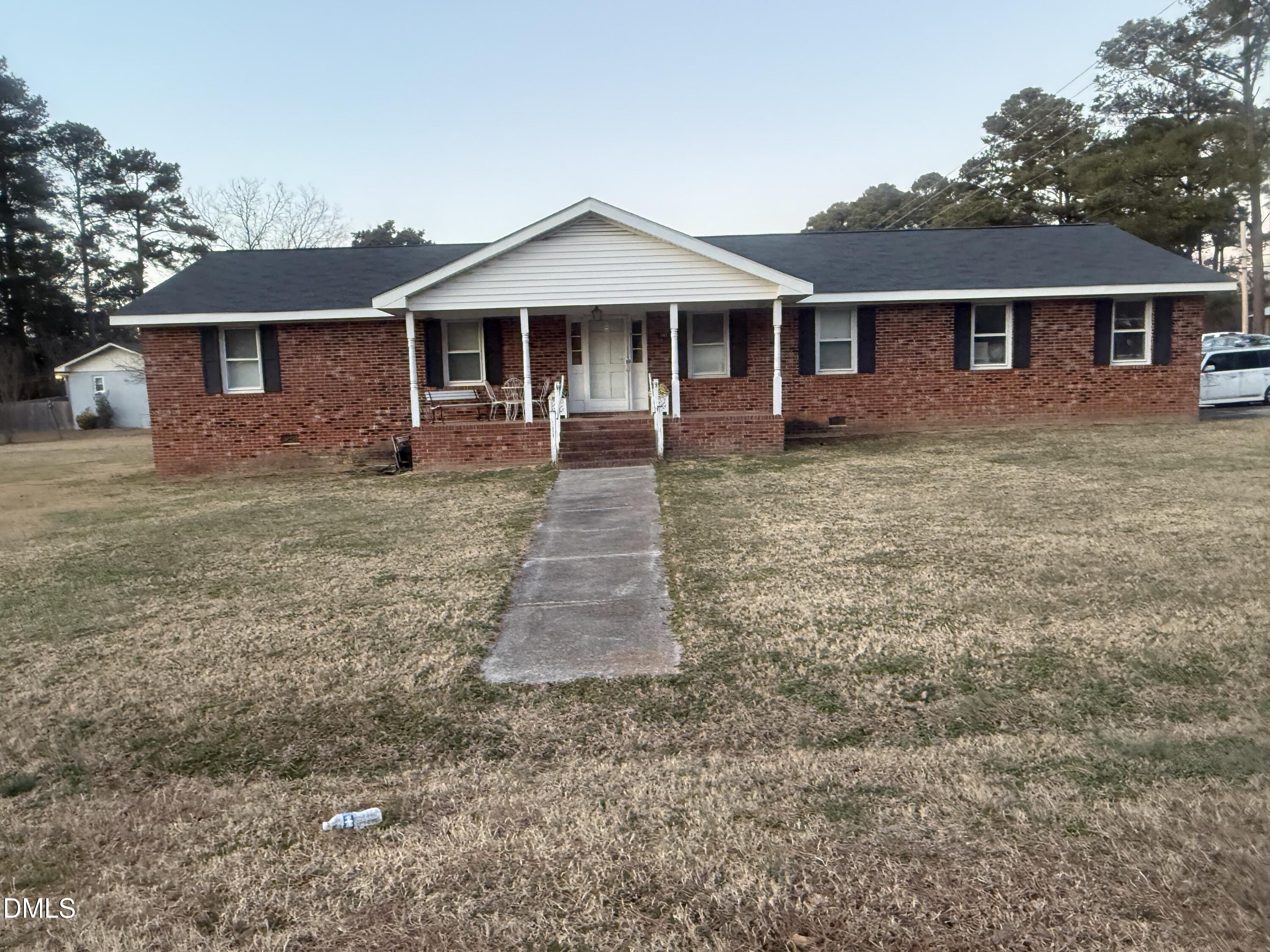 141 Forest Lane Wendell, NC 27591 - Photo 4 of 9 front view of a house with yard
