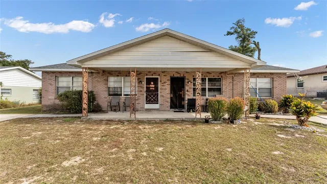 a front view of a house with a patio
