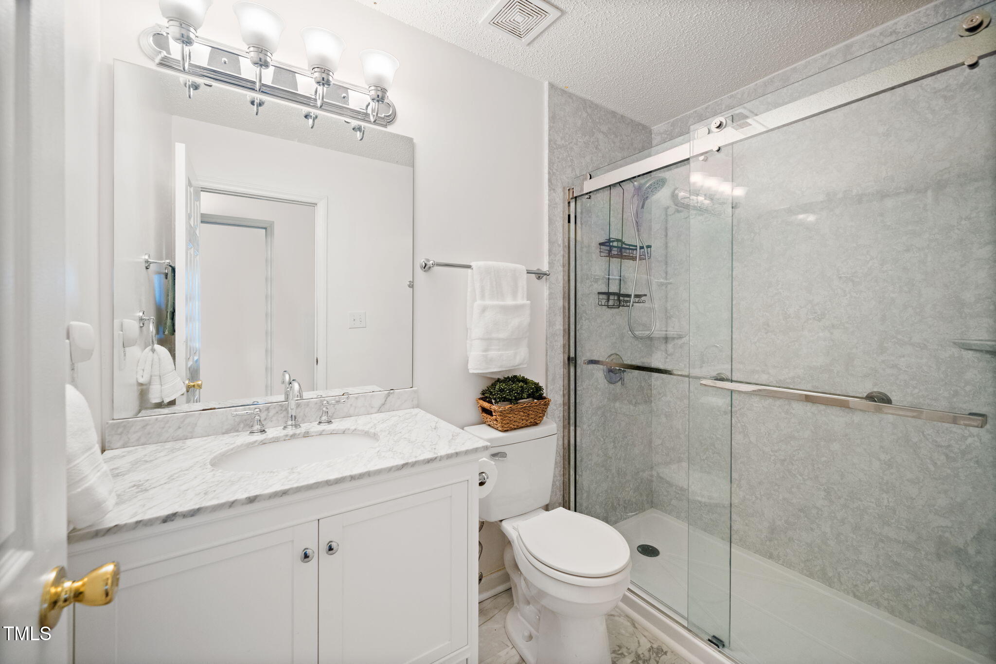 3209 Marshlane Way Raleigh, NC 27610 - Photo 29 of 45 Hall Bathroom