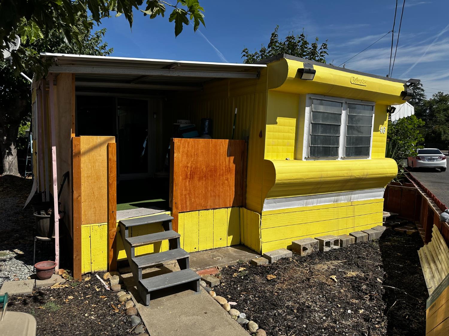 1848 Ashby Road, Unit 46 Merced, CA 95348 - Photo 1 of 11 Front of fenced in space and mobile home.
