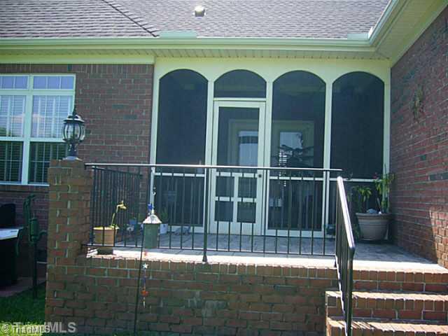 5400 Gray Leigh Drive Oak Ridge, NC 27310 - Photo 13 of 16 Patio/Deck. The screen porch and patio area includes exterior audio speakers for setting the mood, wrought iron railing, and special lighting lantern to create a mood for entertaining.