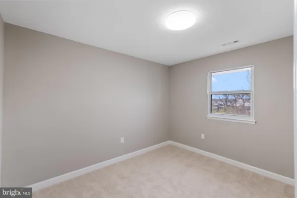 an empty room with a workbench