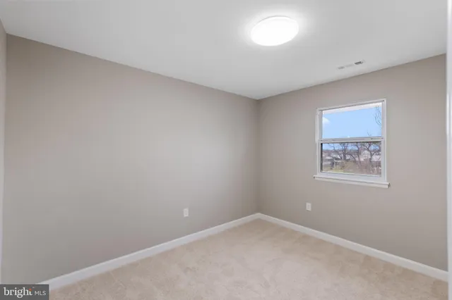 an empty room with a workbench