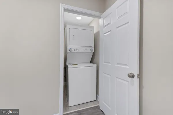 a bathroom with a washer and dryer