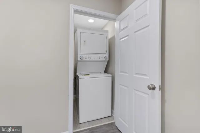a bathroom with a washer and dryer