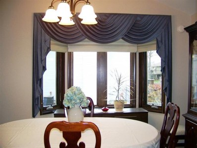 5046 89th Place Crown Point, IN 46307 - Photo 6 of 10 a dining room with furniture and window