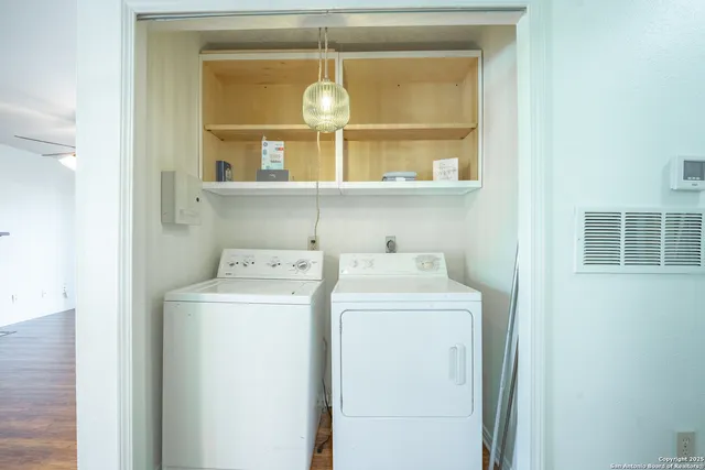 a utility room with dryer and washer