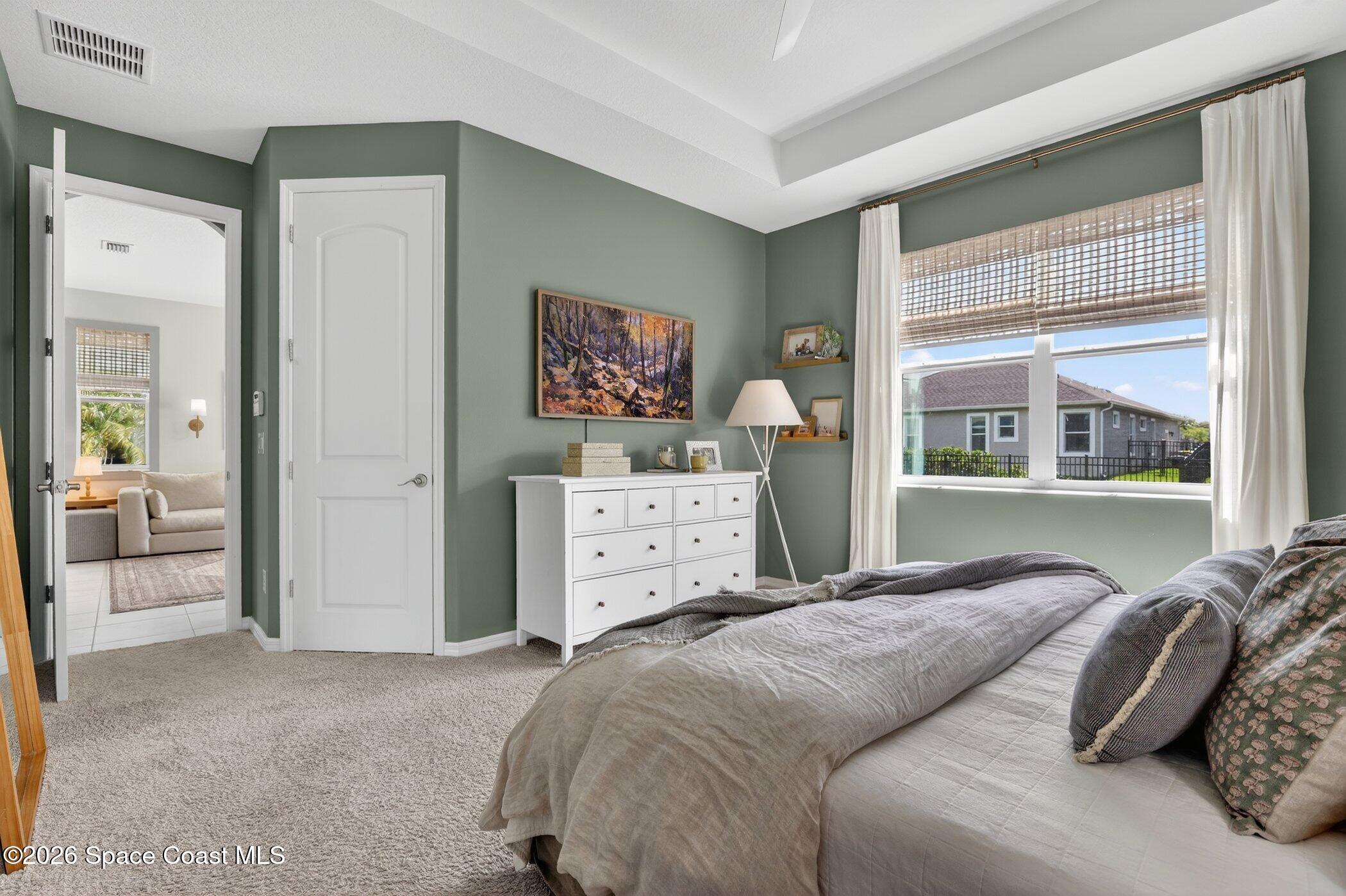 3308 Ribbon Grass Drive Melbourne, FL 32940 - Photo 16 of 46 Primary Bedroom