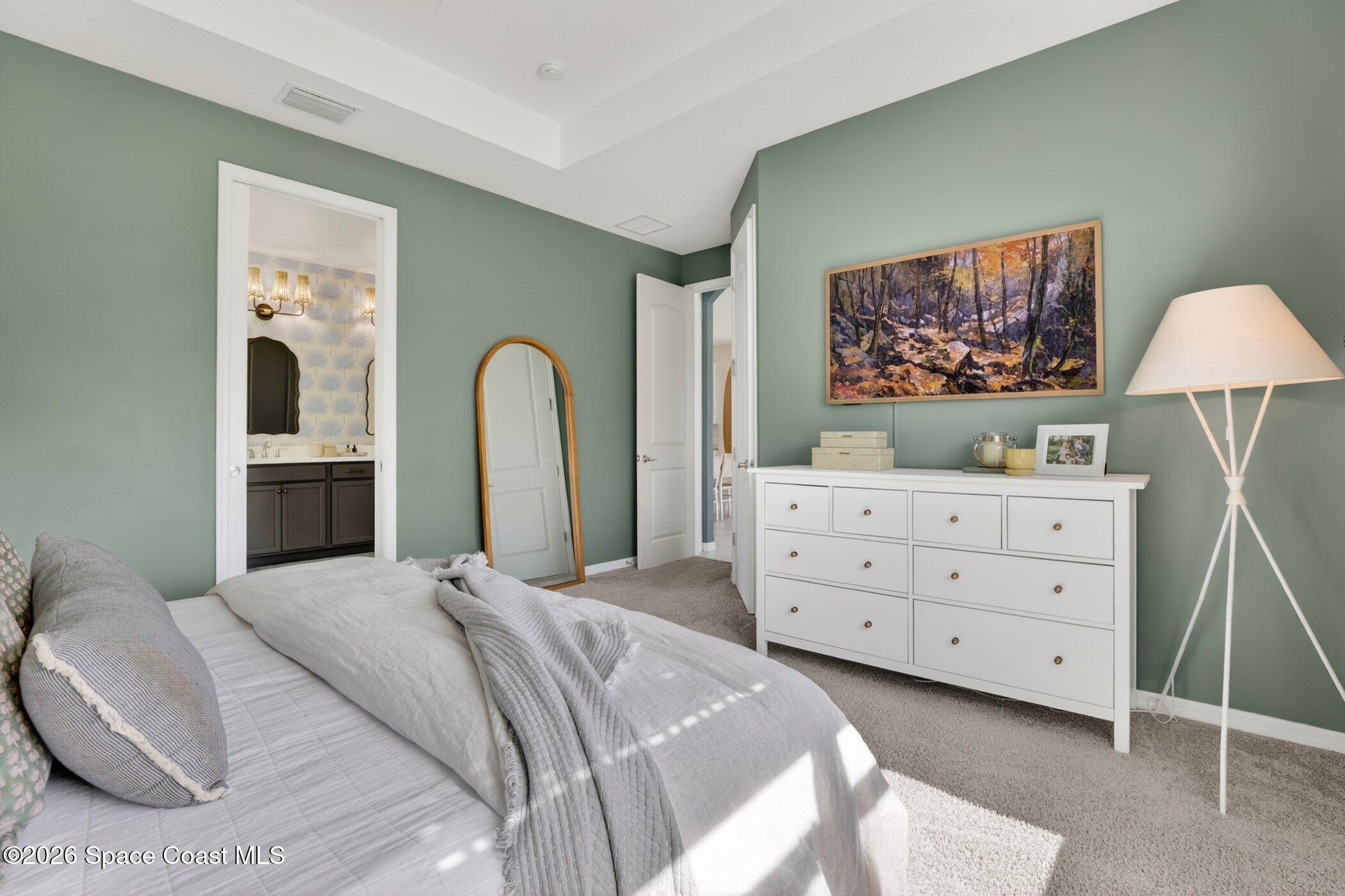 3308 Ribbon Grass Drive Melbourne, FL 32940 - Photo 17 of 46 Primary Bedroom