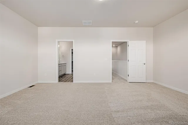 an empty room with an entryway