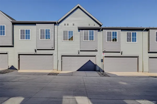 a view of house with garage