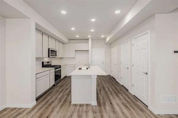 a large kitchen with a lot of counter space