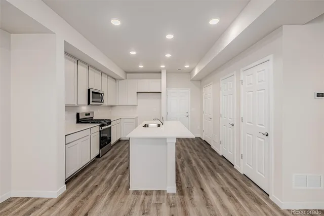 a large kitchen with a lot of counter space