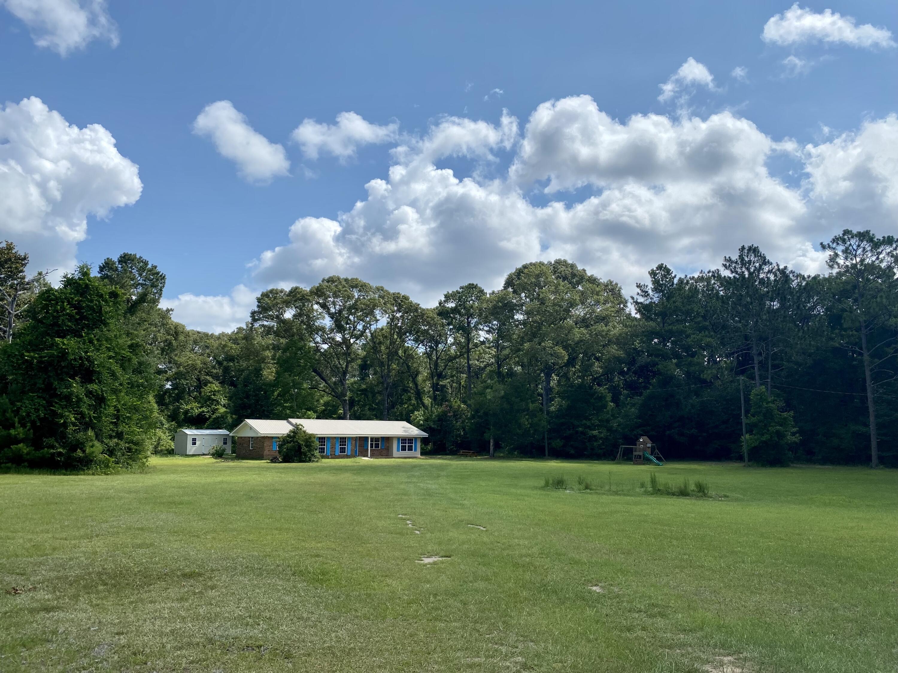 3517 Auburn Road Crestview, FL 32539 - Photo 1 of 22 a view of a garden