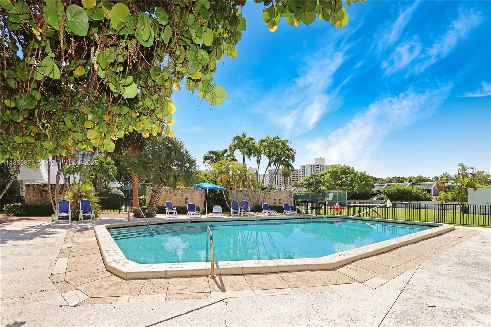 210 Seaview Drive, Unit 207 Key Biscayne, FL 33149 - Photo 19 of 24 a view of swimming pool with a garden