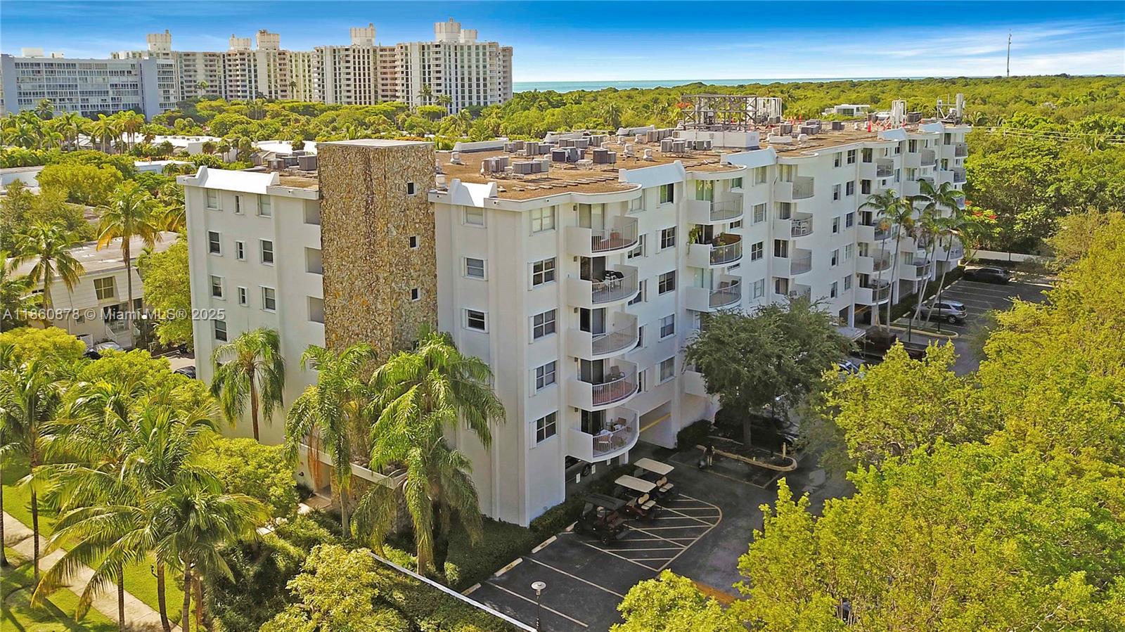 210 Seaview Drive, Unit 207 Key Biscayne, FL 33149 - Photo 22 of 24 a view of a city with tall buildings