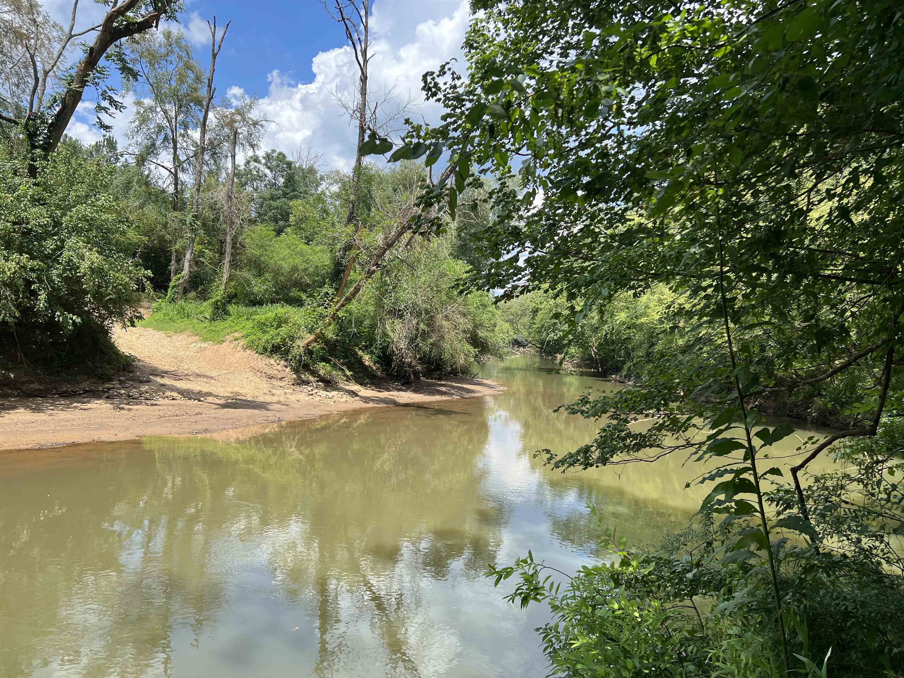 3 Rocky Plains Road Covington, GA 30016 - Photo 1 of 1 a view of a lake from a yard