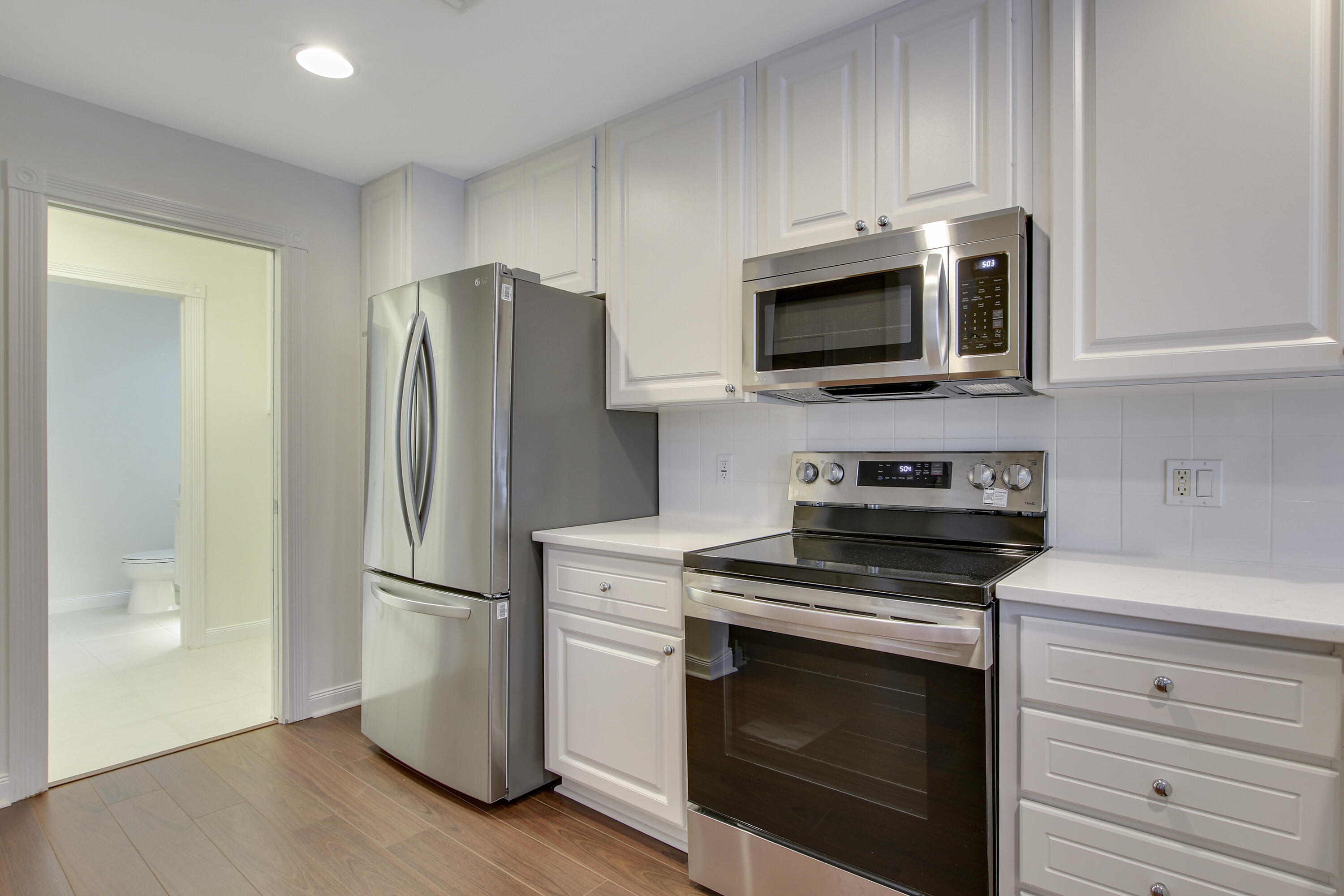 1931 Frederick Small Road Jupiter, FL 33458 - Photo 11 of 46 WHITE CABINETRY