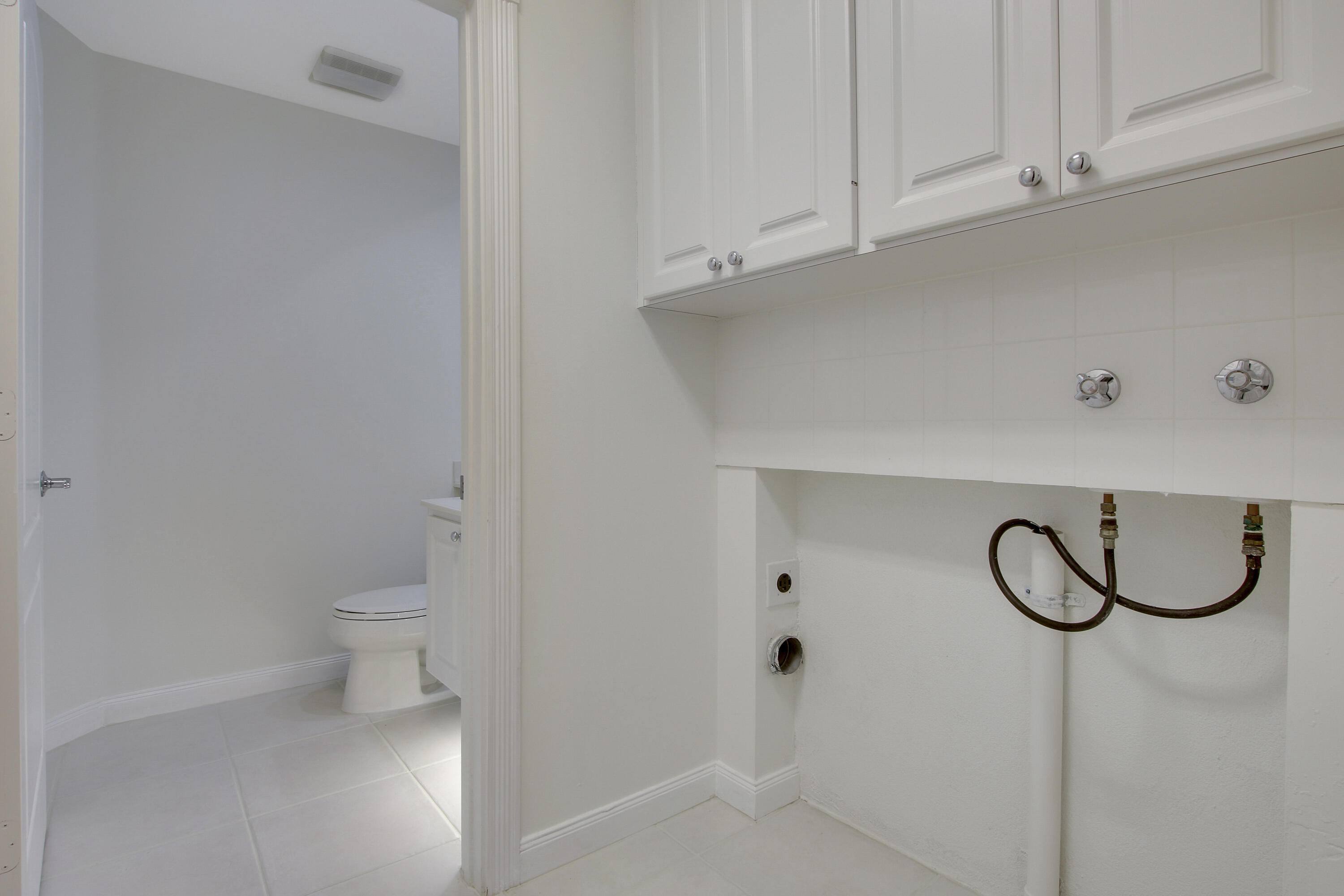 1931 Frederick Small Road Jupiter, FL 33458 - Photo 12 of 46 LAUNDRY ROOM
