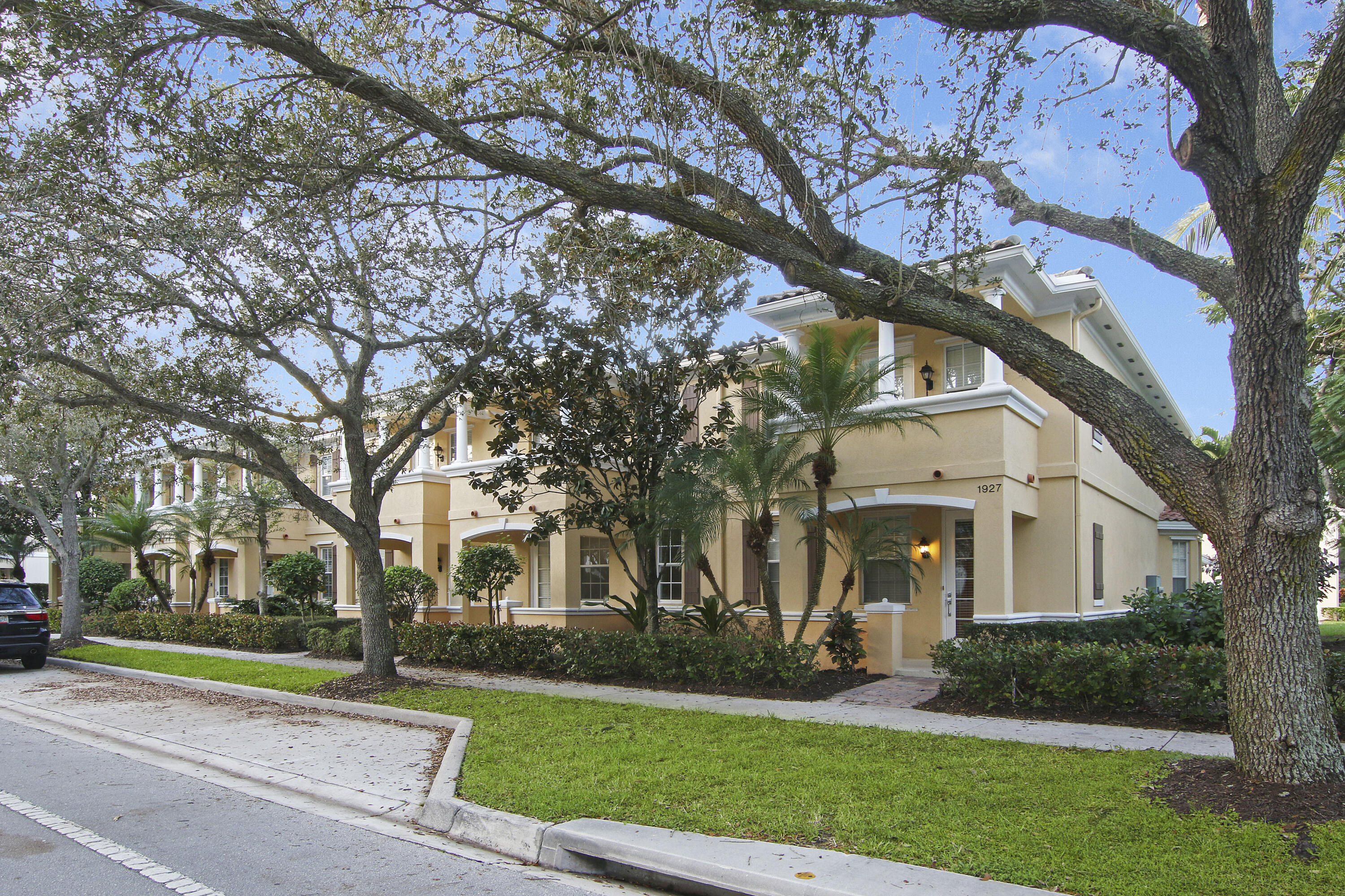 1931 Frederick Small Road Jupiter, FL 33458 - Photo 2 of 46 TREE LINED STREET