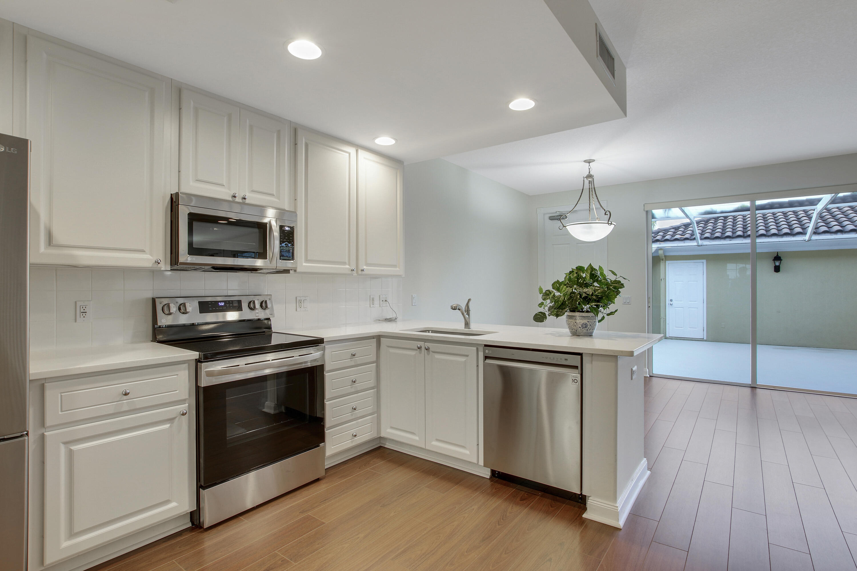 1931 Frederick Small Road Jupiter, FL 33458 - Photo 9 of 46 CLEAN & OPEN CONCEPT KITCHEN