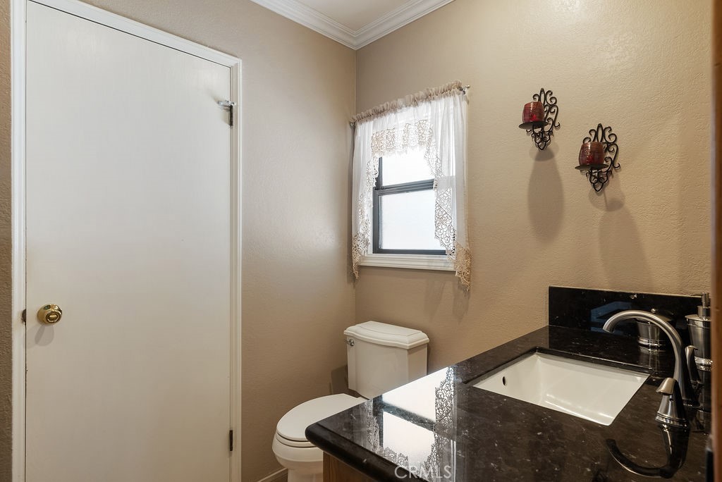 772 East Northridge Avenue Glendora, CA 91741 - Photo 21 of 35 a bathroom with a sink and a mirror