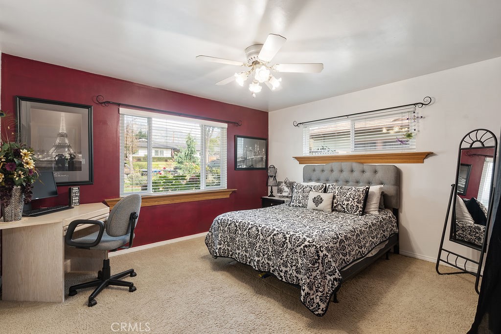 772 East Northridge Avenue Glendora, CA 91741 - Photo 23 of 35 a bedroom with a bed gym equipment and a large window