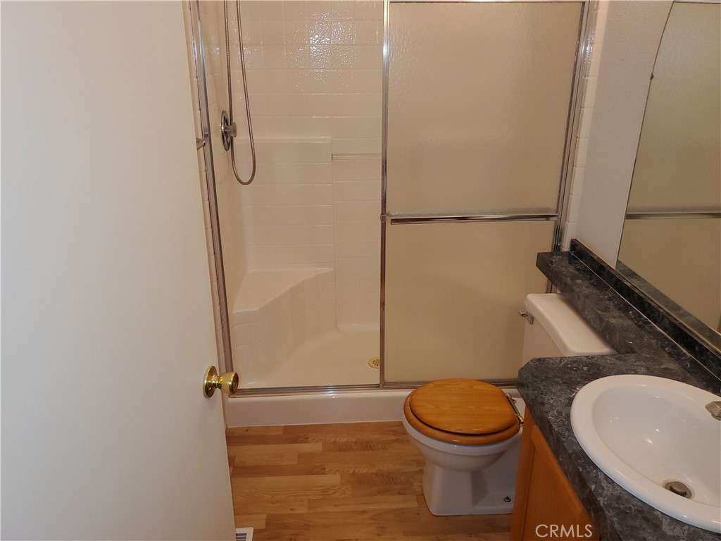 76 Orchardcrest Drive Oroville, CA 95965 - Photo 17 of 24 a bathroom with a toilet and a shower
