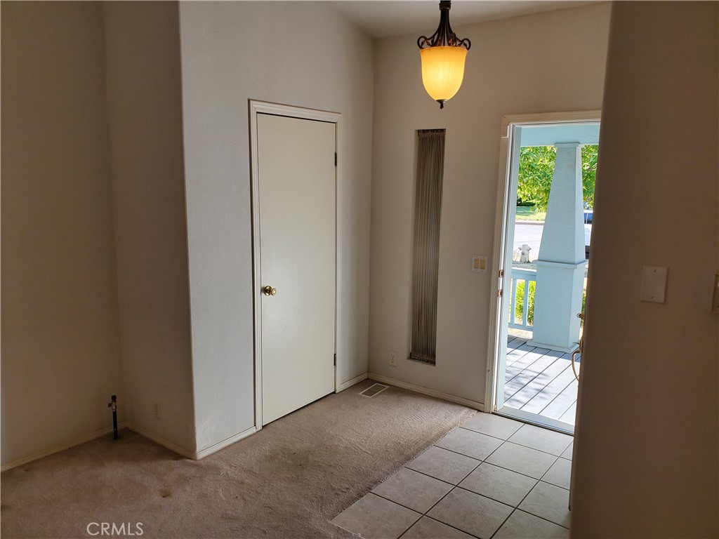 76 Orchardcrest Drive Oroville, CA 95965 - Photo 3 of 24 a view of an entryway with wooden floor