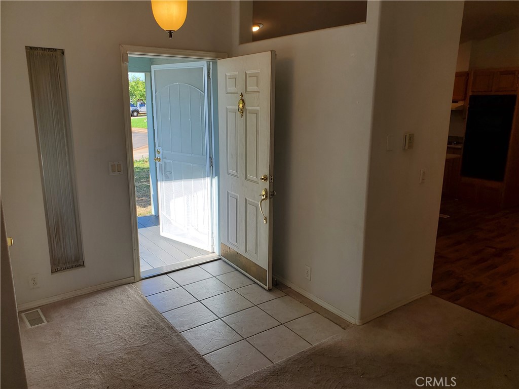 76 Orchardcrest Drive Oroville, CA 95965 - Photo 4 of 24 an empty room with windows
