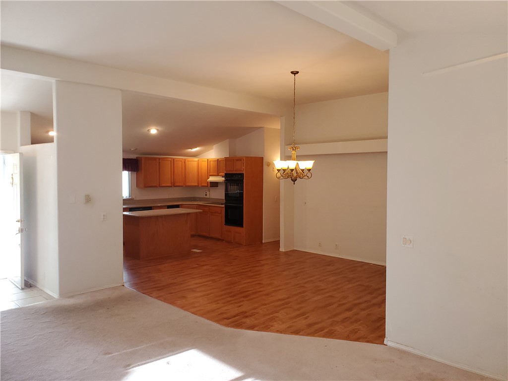 76 Orchardcrest Drive Oroville, CA 95965 - Photo 8 of 24 a view of a kitchen with a sink and a refrigerator