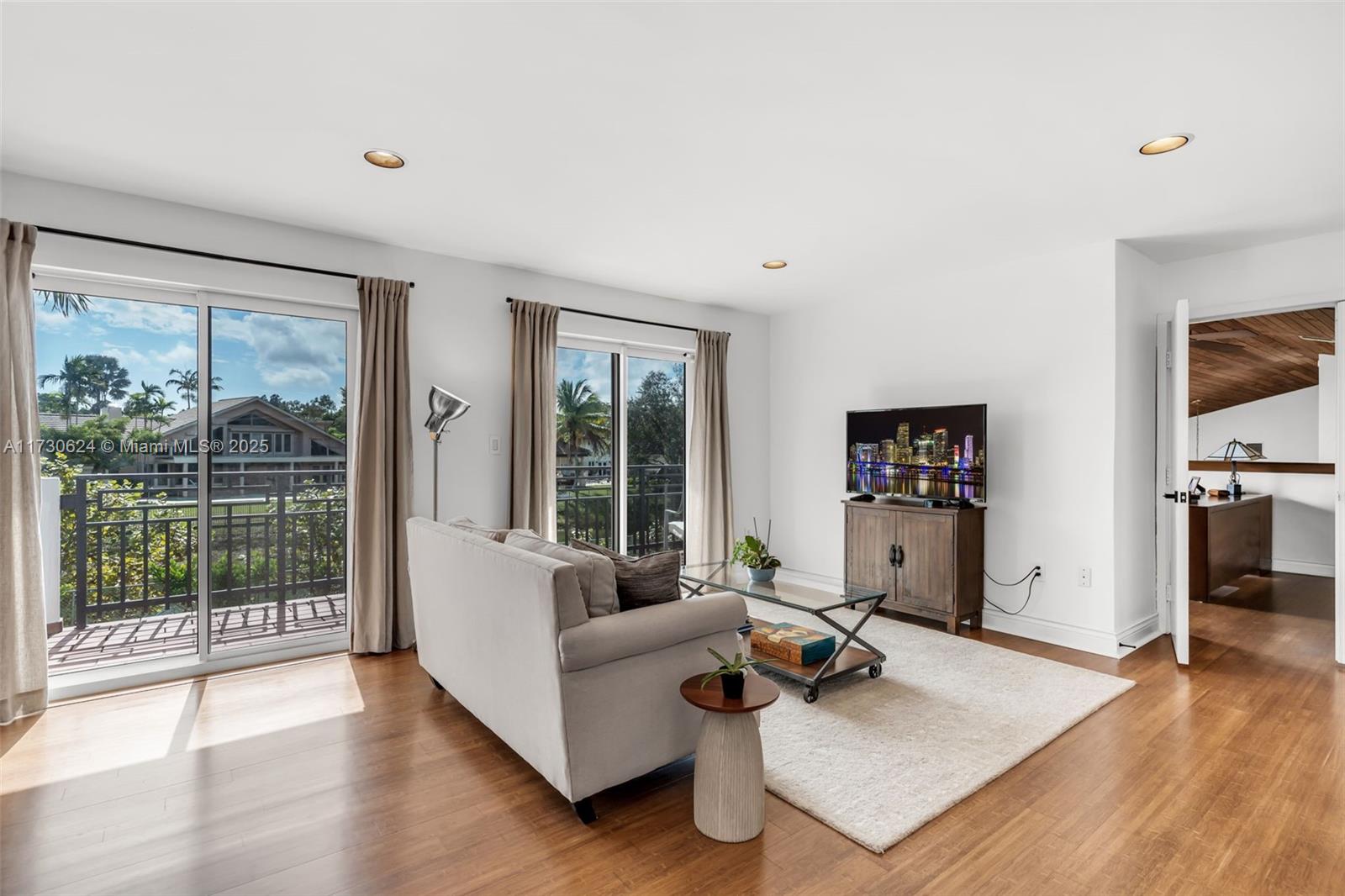 9260 Southwest 101st Street Miami, FL 33176 - Photo 43 of 67 a living room with furniture and a table