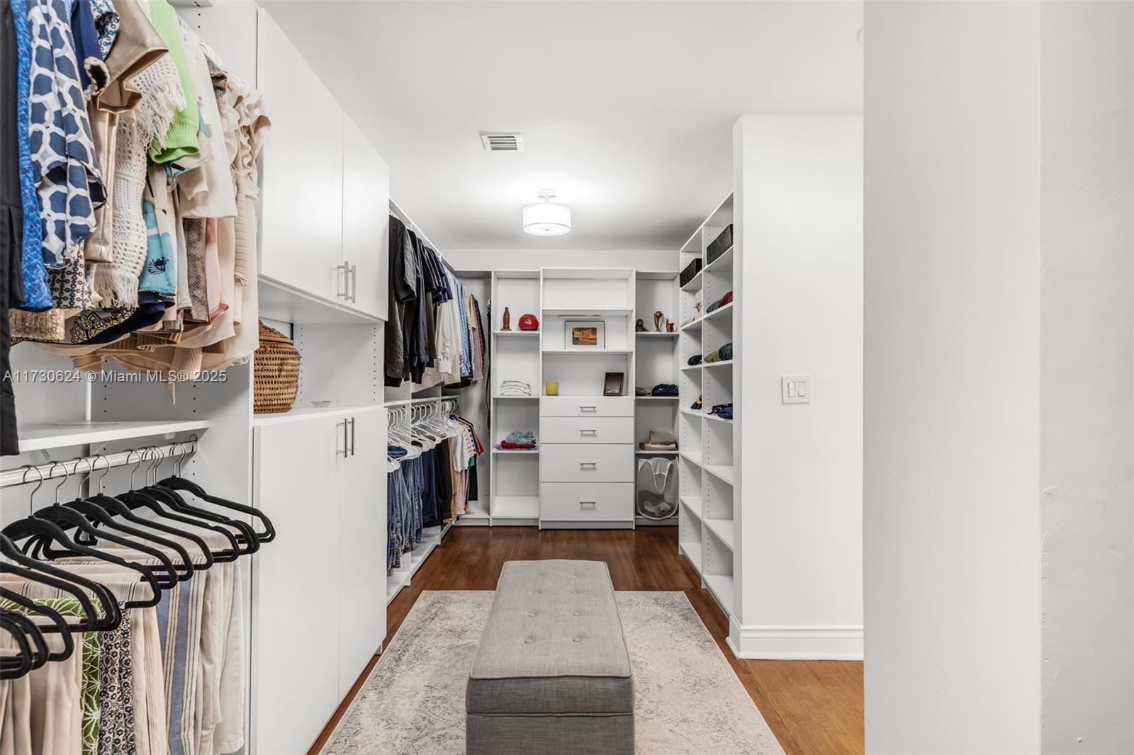 9260 Southwest 101st Street Miami, FL 33176 - Photo 46 of 67 a view of walk in closet with clothes