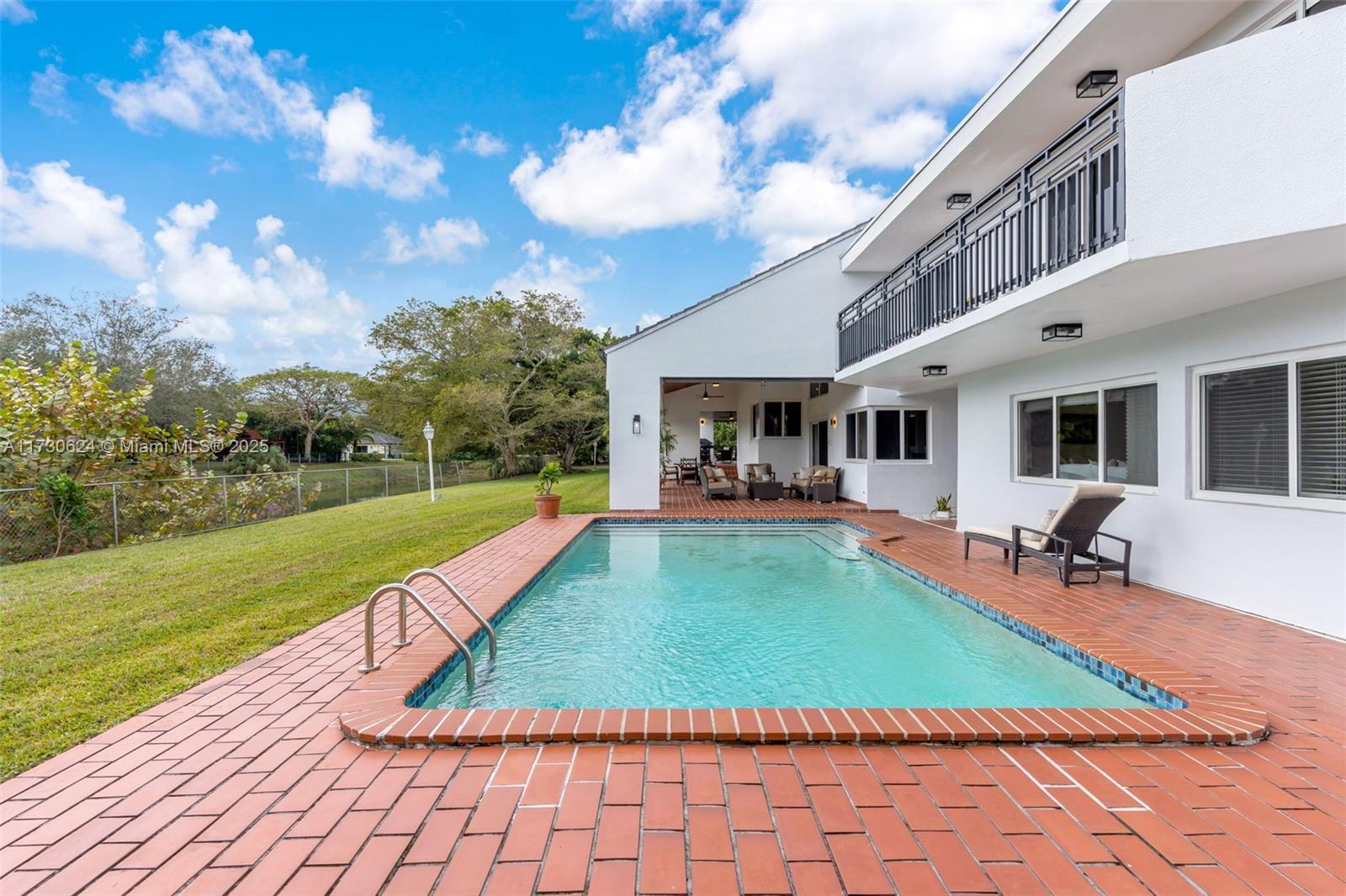 9260 Southwest 101st Street Miami, FL 33176 - Photo 55 of 67 a view of a house with swimming pool and sitting area