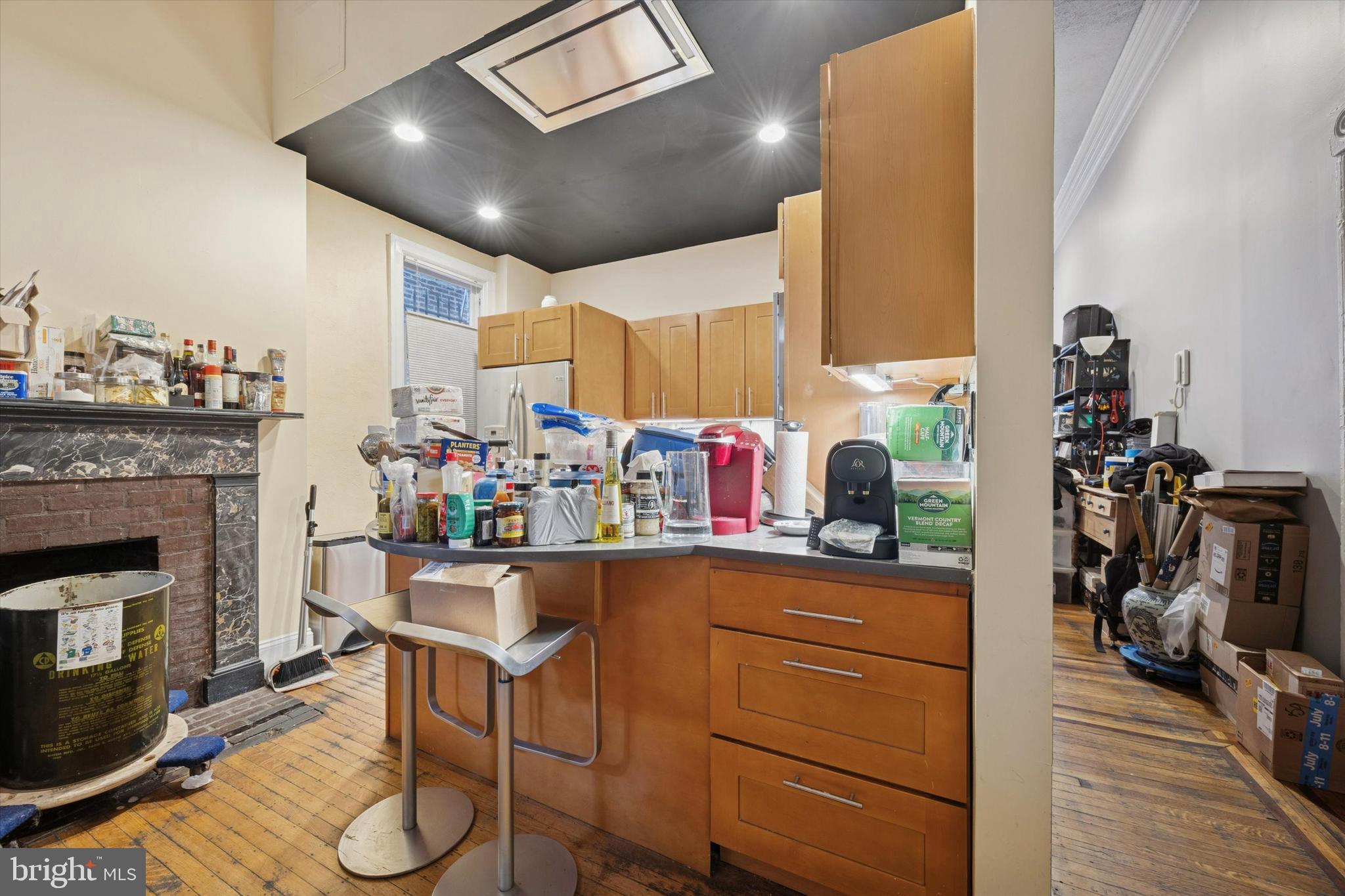 916 Clinton Street Philadelphia, PA 19107 - Photo 4 of 13 a kitchen with a sink and a stove top oven