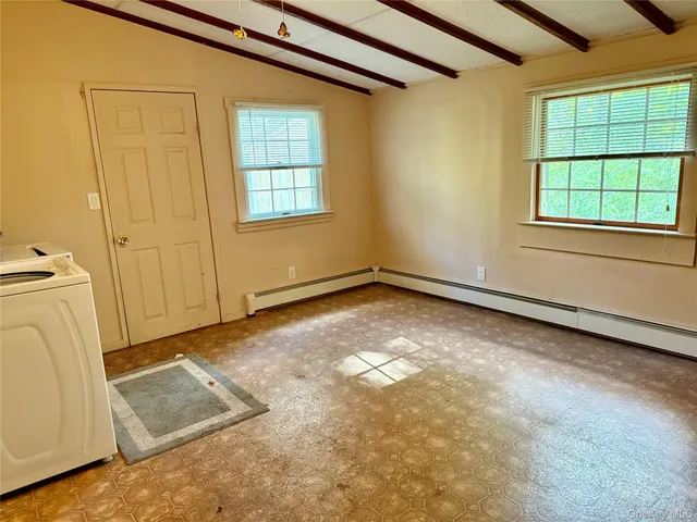 an empty room with windows
