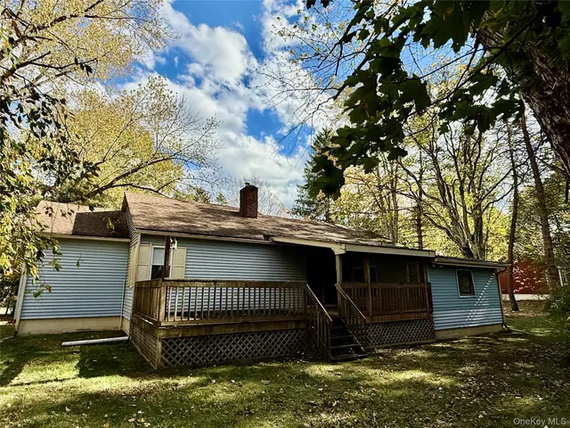 a house with trees in front of it