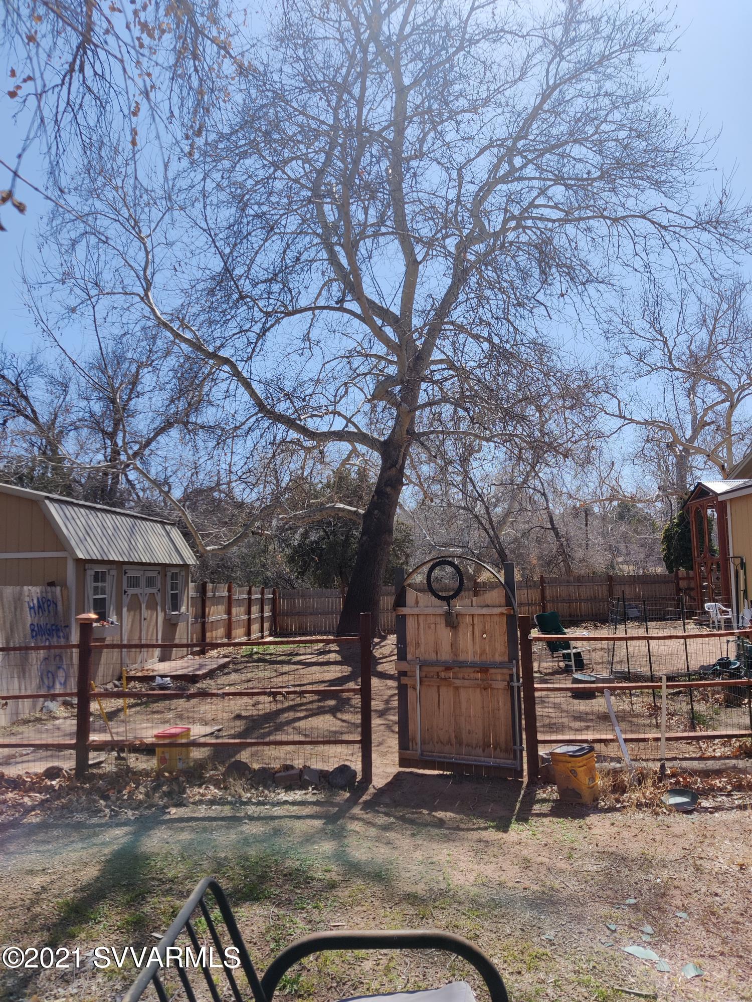 4330 East Beaver Vista Road Rimrock, AZ 86335 - Photo 13 of 15 a view of a yard with wooden fence