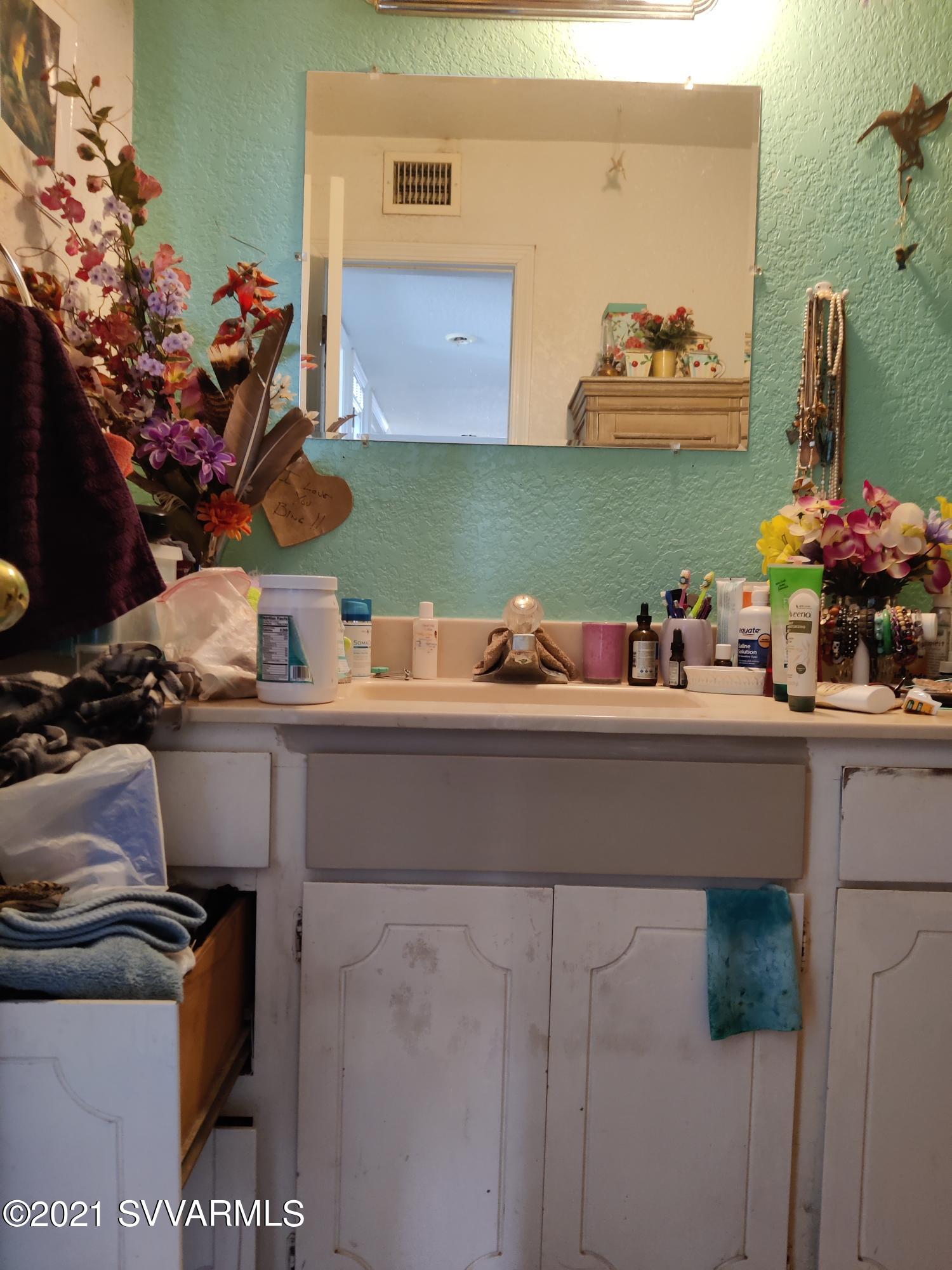4330 East Beaver Vista Road Rimrock, AZ 86335 - Photo 7 of 15 a room with a sink and cabinets