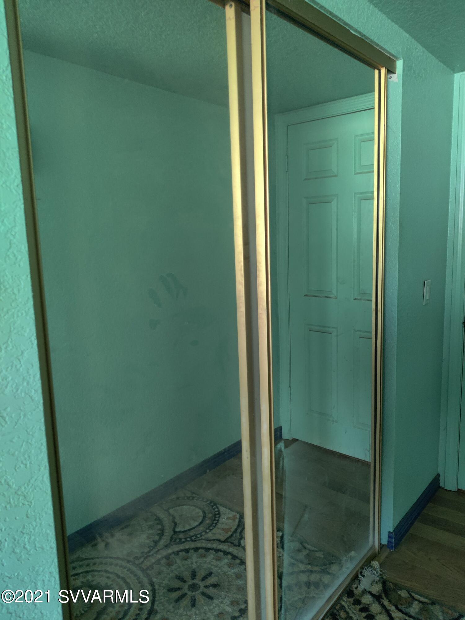 4330 East Beaver Vista Road Rimrock, AZ 86335 - Photo 8 of 15 a bathroom with a glass door shower