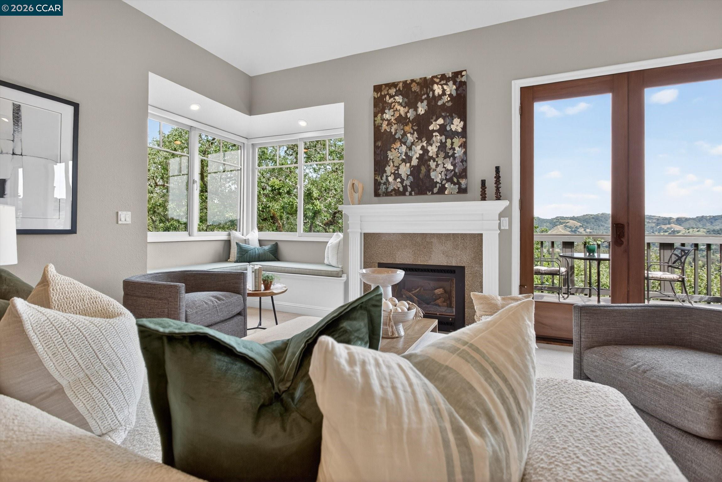 4105 Coralee Lane Lafayette, CA 94549 - Photo 11 of 43 a living room with furniture a large window and a fireplace